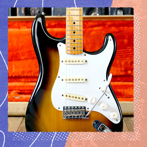 Photo of a Fender guitar on a decorative background