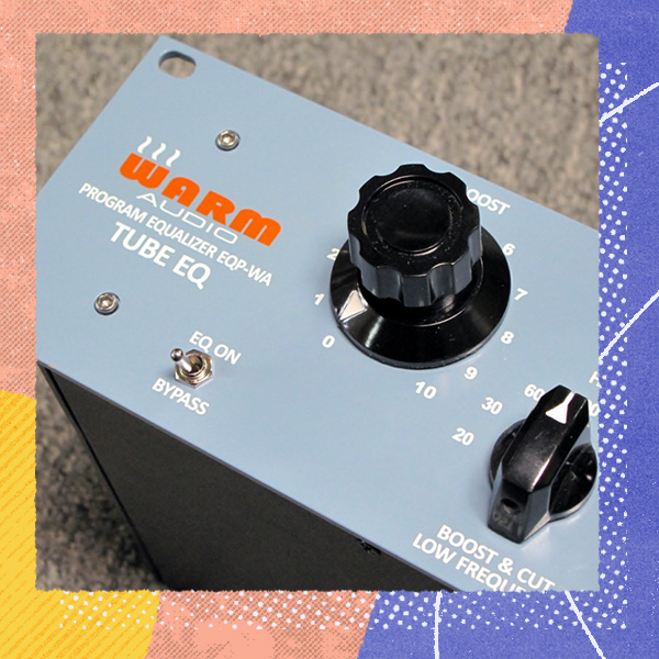 Photo of a Warm Audio tube EQ on a decorative background
